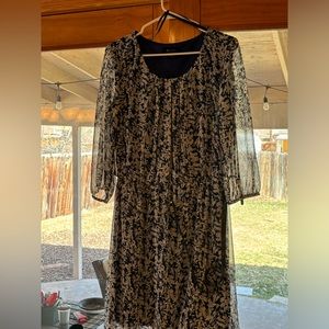 Beautiful dress with see thru 3/4sleeves